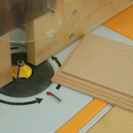 Use a router or Dremel Trio to add a decorative edge to the base. In this instance I used my router table (Triton Router and Triton Router Table) to do this