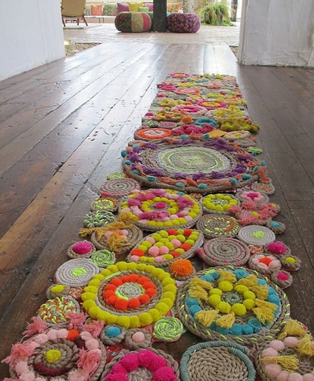 Add wonderful texture underfoot using a combination of materials. Rope and yarn are wrapped and curled to create a masterpiece of design that is so simple to make.