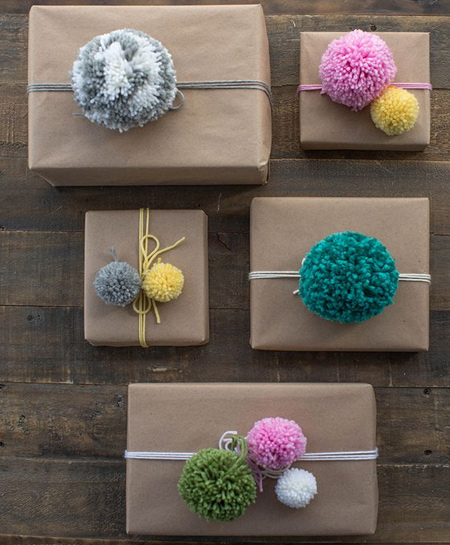 Use colourful pom-poms to decorate Christmas gifts