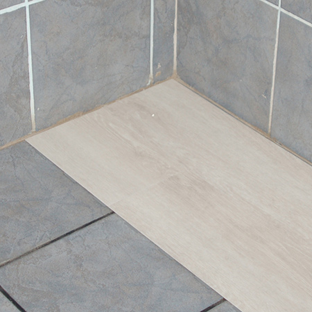 Cover up ugly tiles with Belgotex LVT flooring