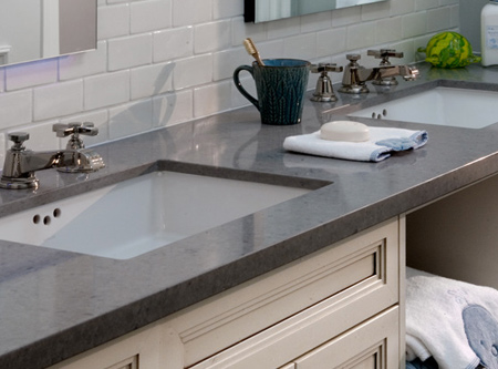 Homeowners are choosing engineered materials over natural stone for countertops.