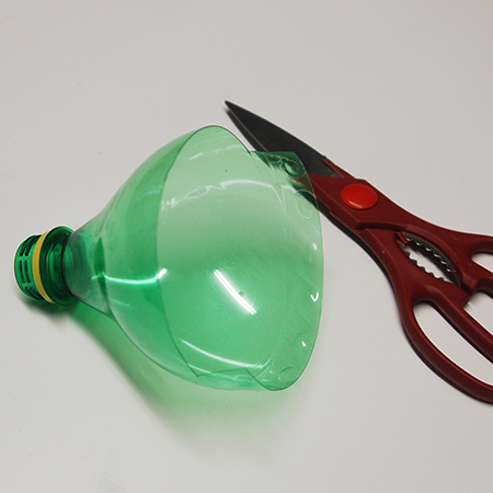 Recycled plastic bottle bird feeder