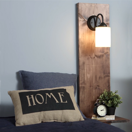 Pop into your local Builders Warehouse for laminated pine to make this wall mounted bedside light and table combination.