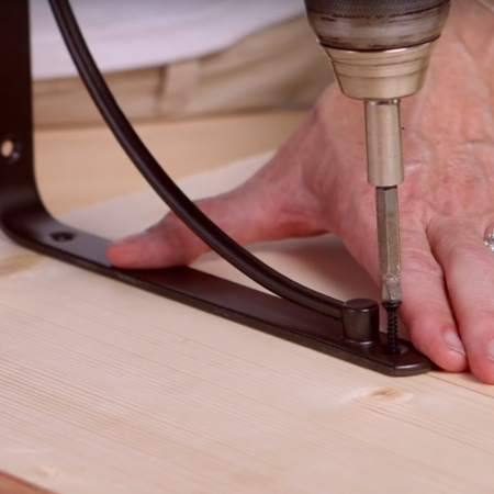 Wall mounted bedside light and table