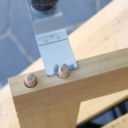 Use a multifunction tool to trim dowels for a flush finish