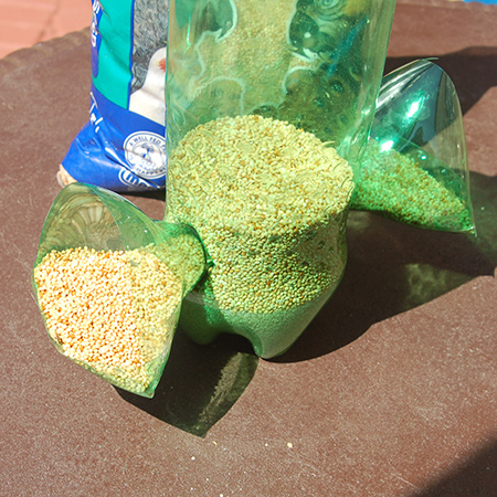 Recycled plastic bottle bird feeder