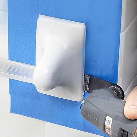 Remove broken or dated bathroom accessories with a multifunction oscillating tool. 