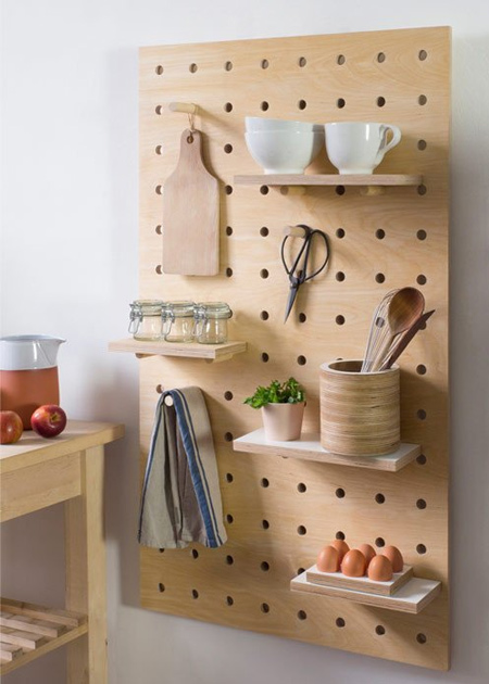 Make your own plywood pegboard as a kitchen shelf.