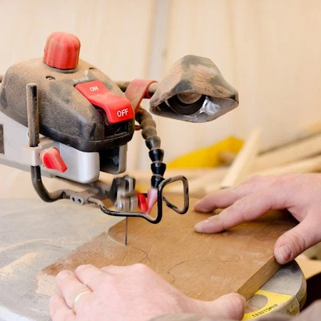 Start by drawing out the shape that you want for your vintage cutting board and then use a scrollsaw or jigsaw to cut this out.