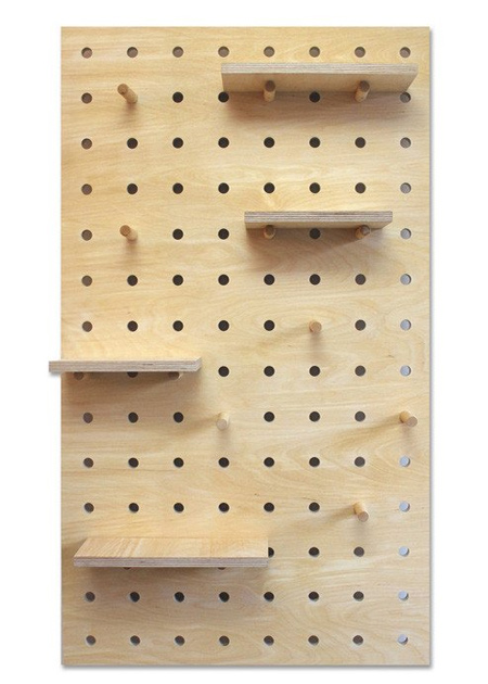 To mount the knobs onto the ends of the dowels, hold these firmly with a vice and use a spade bit to drill a hole so that you can glue these onto the end of the dowels.