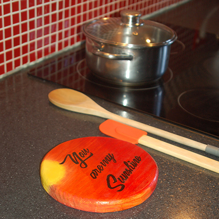 Use pine offcuts to make a colourful, personalised pot trivet that you can keep for yourself or give as a gift. It's also a great Mother's Day gift idea.