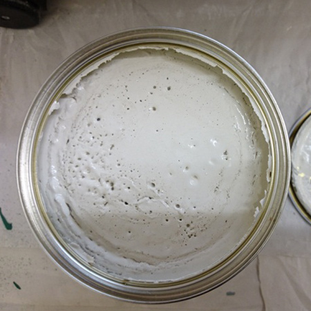 In cold weather, paint can become thick. Simply put the paint tin in the sun to warm up