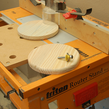 The shapes were cut out with a jigsaw and then given a round-over edge with my router. I have a Triton Router Stand for my router and this is probably my most favourite tool. Using a router table allows you to work with both hands - without clamps - to add a variety of decorative edges and detail to your projects.