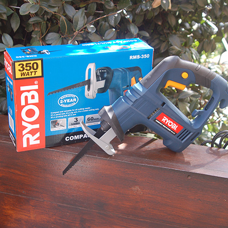 HOME-DZINE | Trimming a large tree is not for sissies, so make sure you have everything you need close at hand when you climb up that stepladder. 