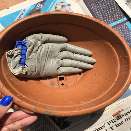 Concrete 'hands' planter