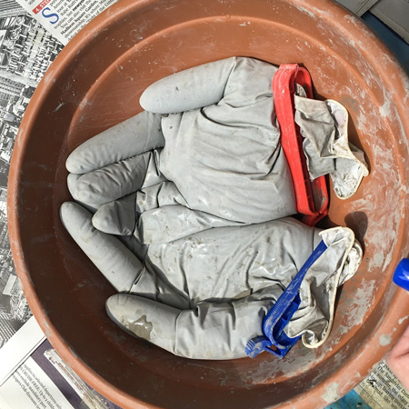 Concrete 'hands' planter