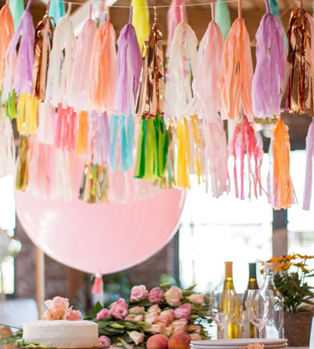 HOME-DZINE | Party Decor - Made using colourful tissue paper and a few craft supplies, you can make these easy tassel garlands to add something extra to your New Year's party or special celebrations. See the video below for more details.