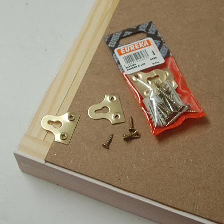 HOME-DZINE | Eureka DIY products - Secure Eureka Slotted Hangers at the top of the backing board.
