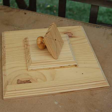 7. Assemble the top as desired. I added a pine knob to the large lantern. The sections were screwed and glued together.