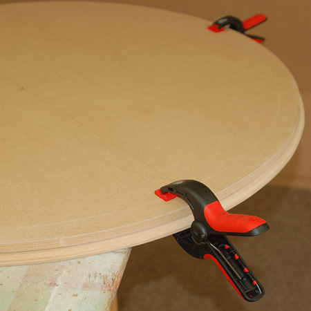 12. Place the smaller top piece on the bottom piece and clamp together for an hour or two.