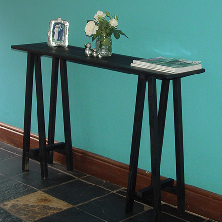 Buy laminated pine shelving and pine planks at Builders Warehouse and grab your tools to make a DIY trestle console table