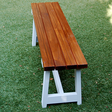 The bench shown here has a slatted seat finished with Woodoc Gel Stain in imbuia, finished with Woodoc 5 Polywax Sealer, and a base painted with Rust-Oleum Chalked paint in aged grey.