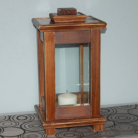 I also used my Triton router and router table to add decorative edges when making the large and small wood lanterns, but the medium lantern has pine moulding around the edge if you don't have a router.&nbsp;