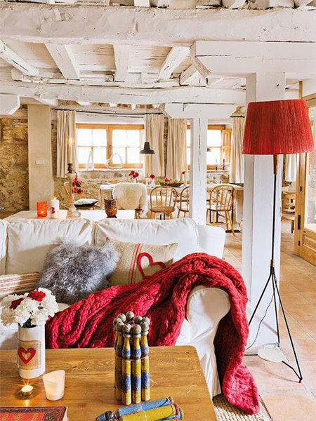 On a remote farm in the heart of farming country, an outbuilding is renovated and designed into a warm, rustic guest cottage.