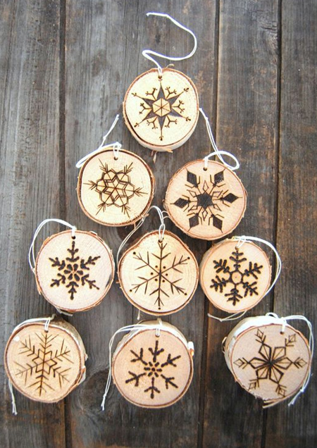 You can even use wood slices from smaller branches to decorate a home for the holidays. The wood slices below were decorated using a wood burning tool - or Dremel VersaTip soldering iron.