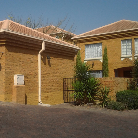 After careful removal of shrubs in the immediate vicinity, the walls were sprayed with SikaGard-703W using a low-pressure spray. This quality product has given complete peace of mind to the owners of these beautiful Tuscan style homes.