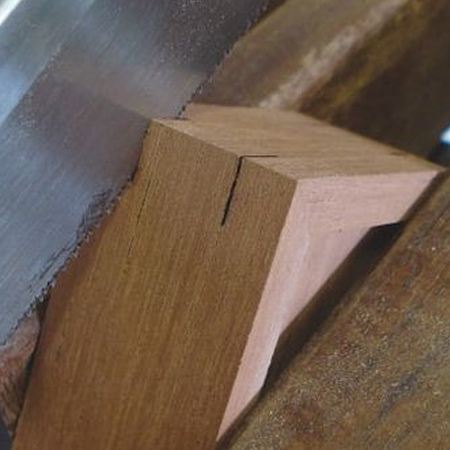 To make the thin cuts for inserting veneer 'keys', place the assembled boy in a clamp and use a Japanese pull saw, backsaw or tenon saw to cut slots to the same thickness as wood veneer.