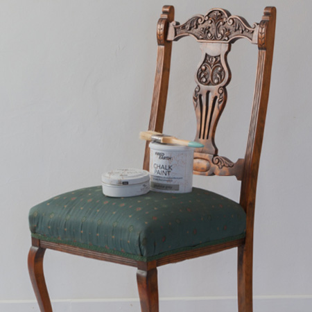 Before you paint the fabric, give the chair frame a couple of coats of chalk paint in a complementary colour - one that goes well with you chair seat colour. 