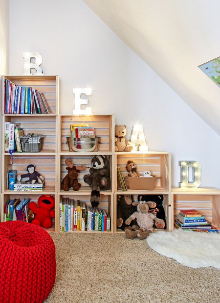 Stackable crates, either bought ready made or make your own, allow you to stack up a storage unit that can be used for books and small toys. Arrange the crates so as to be within easy reach for your toddler, and put down a rug or pouf to make it a comfortable place to sit and read.