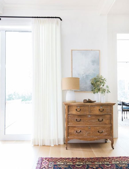 Once you have decided on the exact height and width you want for your curtains, grab a tape measure, pencil and notepad to jot everything down. With these measurements in hand you can shop for rod and rails, and have custom curtains made, or look at your choices for ready made curtains.