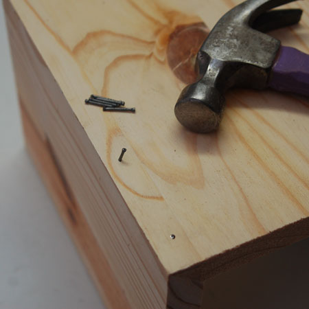 5. To ensure a strong joint, hammer in a few angled panel pins along the joint. These can be covered up with a small amount of wood filler.