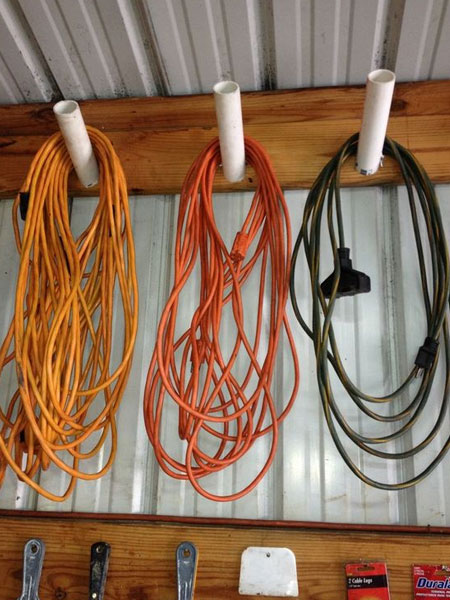 Extension cords for lawnmower, weedeaters and the like can quickly become tangled and damaged. A nifty way to store all your extension cords is to make a simply hanger where they can be hung when not in use.&nbsp;
