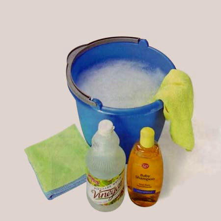 Cleaning grimy windows and glass doors