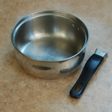 HOME-DZINE | To make the dog bowl holder you first need to determine if the pan or pot is suitable. The bowl (bottom section) must be smaller than the lip (top), or it won't be able to fit. You'll also need to remove the handle.