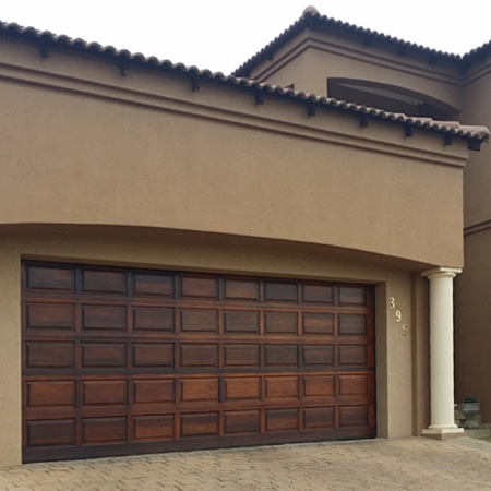 HOME-DZINE | Timber garage doors look beautiful, but they do need regular maintenance to keep them looking so good. We offer tips on maintaining a timber garage door and adding curb appeal.