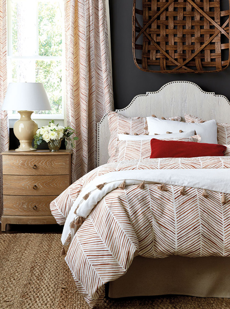 Charcoal walls bring out the best of cranberry accents and enhance rustic accessories. 