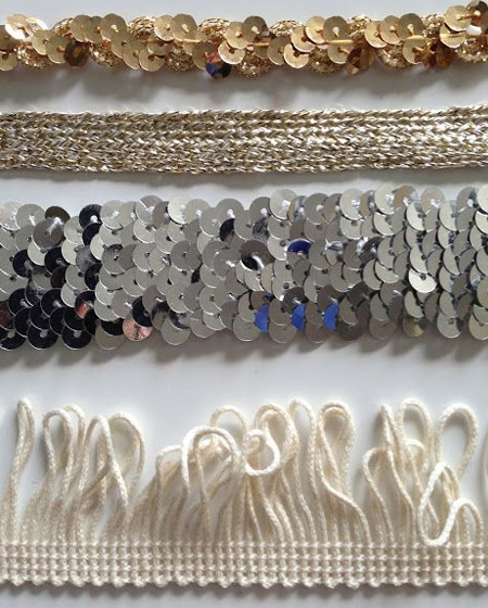 Shop around at local fabric stores for assorted sequin trim in silver and gold to add to your uniquely styled Moroccan wedding blanket.