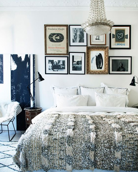 Sophisticated bedroom with silver-sequined Moroccan wedding blanket.