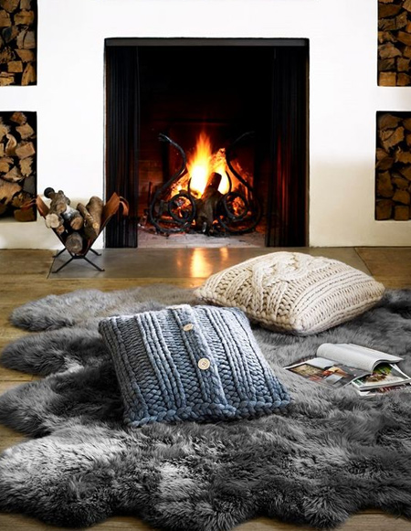 Repurpose old sweaters into chunky cushion covers, or dust off your knitting needles and make your own.