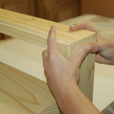 7. Squeeze wood glue into the tops and carefully place on the high sides, adjusting until the edges are flush.