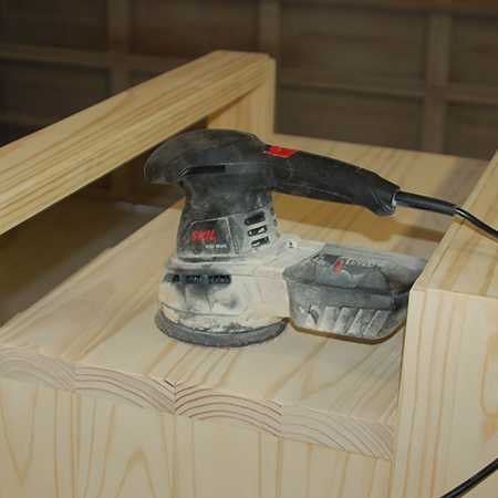 9. Sand the table with 120-grit to remove any uneven edges and then 180-grit for a smooth finish. Wipe clean.