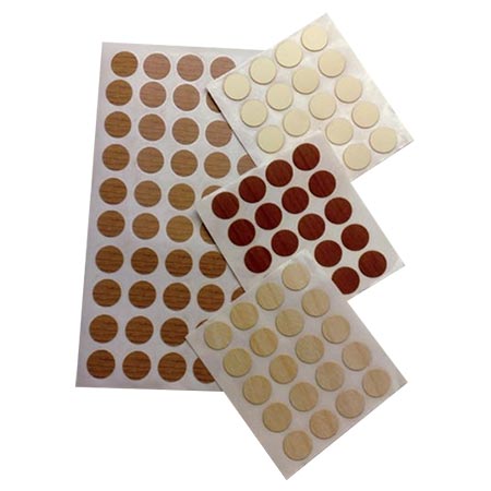 Self-adhesive screw covers - available from Gelmar - come in a wide variety of colours and wood grains. Choose the self-adhesive cover in a colour or wood grain that matches the finished piece. They are easy to apply; simply peel and stick.