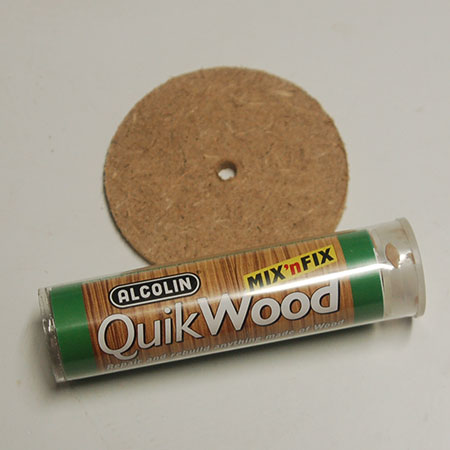 drill bit makes a hole in the cover flap