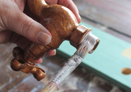 5. Apply cold glue to the base of each tap and fit into the holes. Let the glue dry overnight.