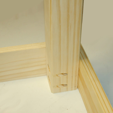 5. Secure the legs to the frame with 50mm screws.