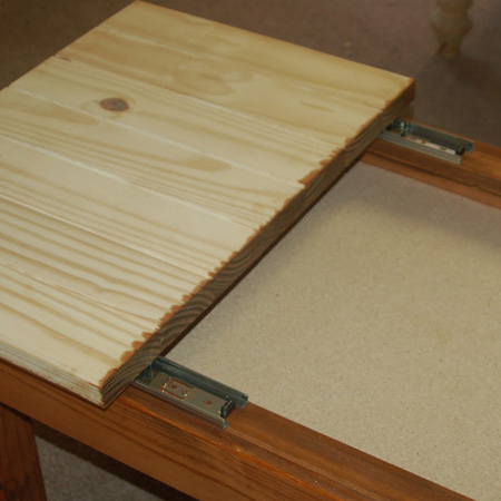 14. Slot on the tops and check that they sit flush when closed. Do any adjustments or sanding before staining or sealing the tops.